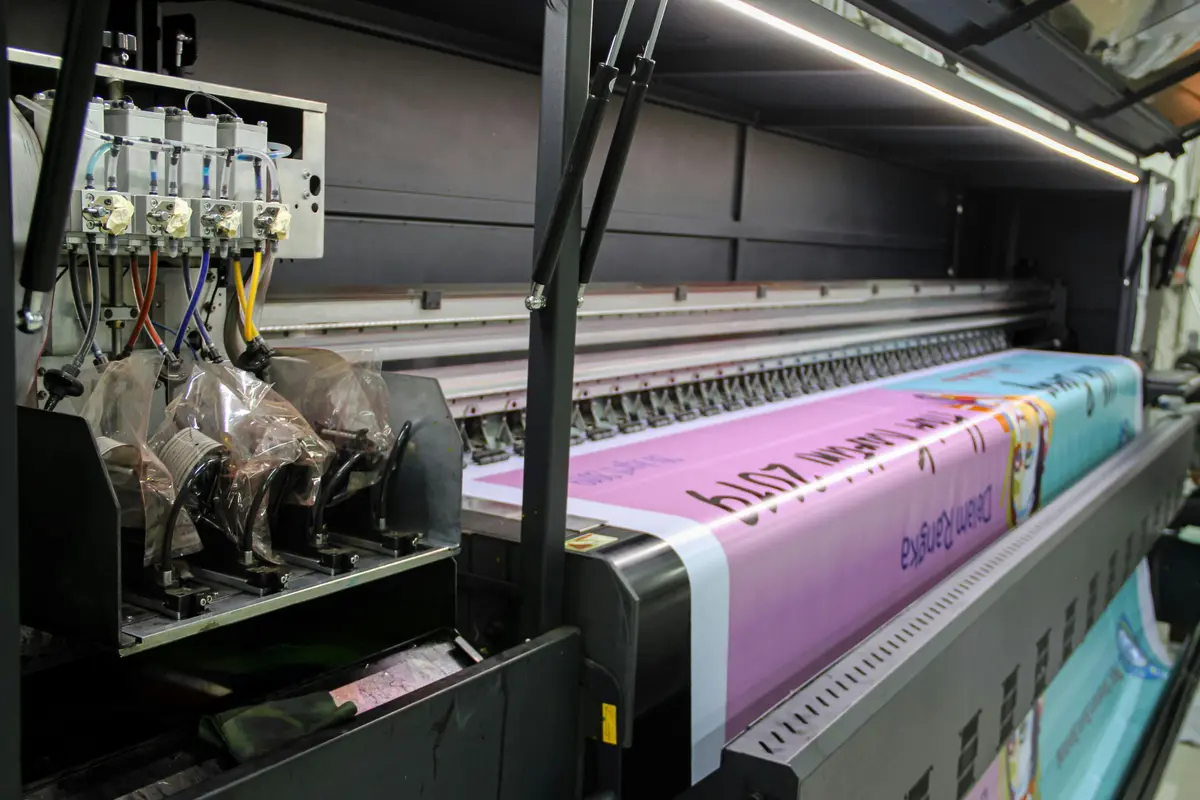 Large-format colour graphics being printed